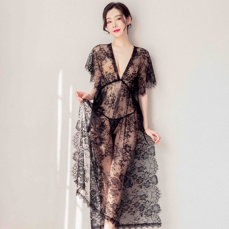 Elegant black lace sleep dress featuring sheer mesh and high slit, perfect for women seeking sexy yet sophisticated nightwear...