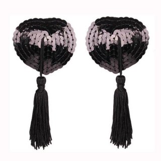 Heart-shaped silicone bra inserts with sequins and lace trim, featuring black tassels for a flirty look.