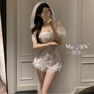 Woman in mirror wearing white lace bridal lingerie set with veil, modest yet sexy design for sleepwear or cosplay.