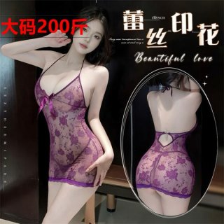 Woman modeling plus size purple lace lingerie sleep dress with sheer floral pattern and bow detail, back view shown.