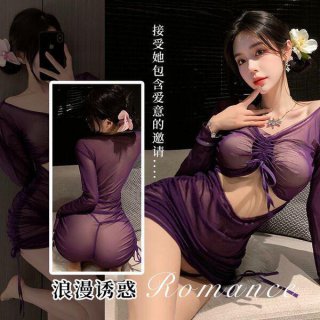 Woman modeling purple sheer lace lingerie set with ruched mini dress, drawstring waist, and floral hair accessory.