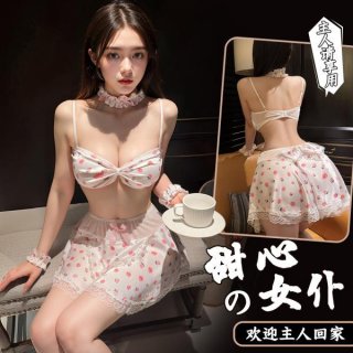 Woman modeling a white polka dot floral maid outfit with adjustable ties, featuring a sweet chef costume design and no-remove...