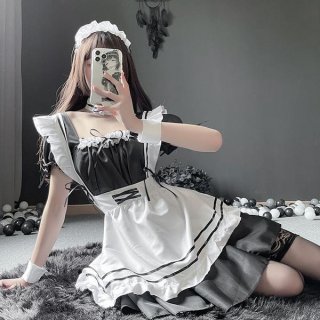 A woman poses in a maid costume cosplay dress, featuring a cute japanese style with black and white colors, perfect for women...