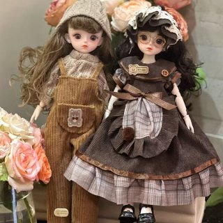 Two adorable bjd dolls dressed in charming outfits, perfect for princess-themed dress-up play and collection. ideal for girls...