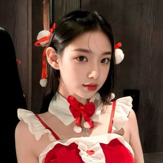 A young woman wears a festive christmas red velvet babydoll dress set, featuring lace details and a charming bow hair accesso...