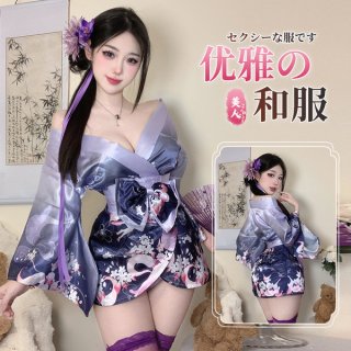 A woman wearing a purple and pink anime-inspired kimono-style sleepwear set, featuring floral patterns and a flowing design, ...