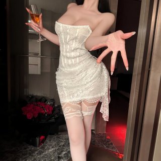 Woman wearing feiniao moon gaze lace bodysuit, holding wine glass, posing in elegant white mesh camisole dress with lace trim...