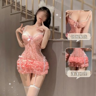 Woman modeling pink french-style lace corset top with bow backless bralette, push-up cups, and cherry cake dress details.