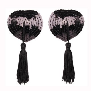 Heart-shaped silicone bra inserts with sequins and lace trim, featuring black tassels for a flirty look.