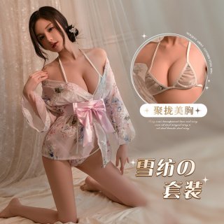 A woman poses wearing a delicate japanese kimono-style lingerie set, featuring floral patterns and a soft pink ribbon. the ou...