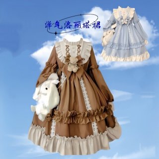 Lolita-style dress featuring ruffles and lace, perfect for cosplay with a cute bunny accessory.