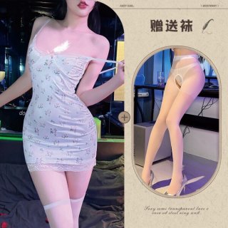 Woman modeling a white floral lace trim lingerie sleep set, featuring a sheer slip dress and matching stockings.