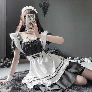 A woman poses in a maid costume cosplay dress, featuring a cute japanese style with black and white colors, perfect for women...
