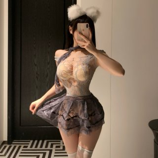 Woman modeling mist temptation lingerie set – sheer mesh sleepwear with cat ears, sensual and alluring design.