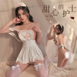 Woman wearing white nurse costume lingerie set with pink accents, sheer stockings, and bow details; includes back view showin...