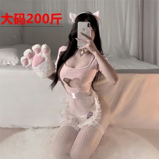 Woman in pink cat maid outfit with open bust, fishnet stockings, and fluffy paw gloves.