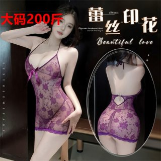 Woman modeling plus size purple lace lingerie sleep dress with sheer floral pattern and bow detail, back view shown.