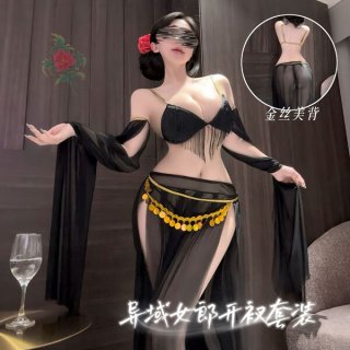 Model wearing black sheer plus size sensual lingerie set with gold coin belt, fringe bra, and flowing sleeves for exotic eleg...
