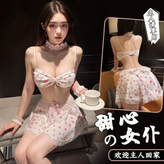 Woman modeling a white polka dot floral maid outfit with adjustable ties, featuring a sweet chef costume design and no-remove...