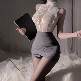 Woman wearing qqny pure & tempting lingerie set with lace top and pencil skirt, holding a tablet in a stylish pose.