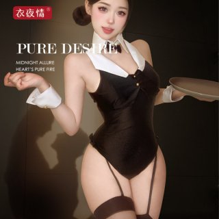 Woman in black bunny girl bodysuit with white collar and cuffs, holding a tray.