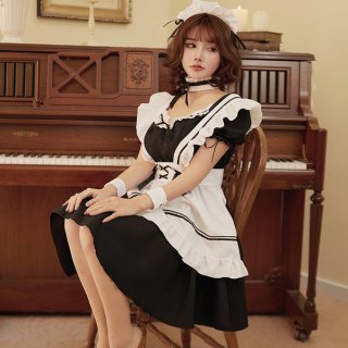 Sexy maid costume set for women featuring a black and white outfit with ruffles, perfect for roleplay and bedroom play.