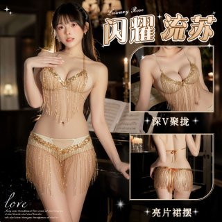 Woman modeling a gold shimmering tassel sheer dancer costume, featuring a deep v bra and open-crotch thong with g-string.