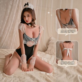 Model wearing yuedie lace ruffled chef & maid costume - sexy tight-fit bodysuit with corset-style shaping, kneeling on bed.