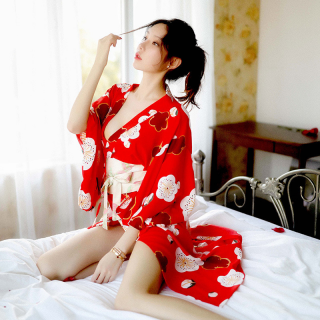 A woman poses elegantly in a red japanese-style lace robe adorned with floral patterns, featuring a deep v neckline and long ...