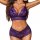 Woman wearing a purple lace open-crotch lingerie set with sheer detailing and bow accents.