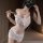 Woman wearing white lace sheer bodycon nightdress set with embroidered floral details, mesh babydoll lounge style.