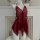 Red sheer mesh sleep dress with butterfly neck strap and backless lace design on a mannequin.