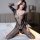 Woman wearing qingyege sheer mesh lace bodysuit with open-crotch design, posing on bed in plus size lingerie.