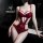 Woman in burgundy lace lingerie set, sheer plus size intimate outfit with strappy design.