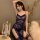 Curvy woman in plus size lace babydoll dress, sheer mesh sleepwear set with floral details and thigh-high stockings.