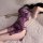 Woman in purple lace split cheongsam sleepwear, vintage-inspired erotic lingerie for plus size women up to 200 lbs.