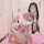 Woman in plus size maid costume taking mirror selfie with hello kitty pillow, featuring white dress with red accents and fril...