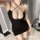 Sexy black lace bodysuit dress with deep v-neckline, perfect for women seeking seductive sleepwear.