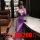 Woman wearing purple plus size sexy lace nightgown with deep v-neck and high side slit, bodycon fit for women up to 200 lbs.