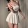 Woman modeling a white plus size sexy lace sleep dress with open-crotch design, featuring a busty fit for seductive allure.