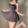 Woman wearing a gray satin slip nightgown with thin straps, flared hem, and open-crotch design for seductive lingerie appeal.