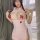 Sexy pink nurse costume with red cross details, designed for plus size women, featuring a revealing top and matching accessor...