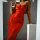 Elegant red lace slip dress with floral embroidery, adjustable straps, perfect for evening wear.