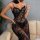 Elegant black lace slip dress featuring floral embroidery, adjustable straps, and a deep neckline, perfect for evening wear.