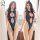 Two women wearing black sheer cut-out high-slit devil-themed bodysuits made from matte leather material, perfect for cosplay ...