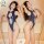 Two women wearing matching dark blue one-piece swimsuits with cutouts and high slits, posing together in a bathtub. the outfi...