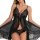 Woman wearing black sheer mesh lace chemise with matching lingerie set, romantic nightwear collection.