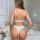 White floral lace lingerie set featuring wire-bralette top and thong bottoms, perfect for summer elegance.