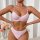 A woman models a 2024 summer floral lace lingerie set featuring a wire-bra and matching high-waisted bottoms, perfect for eur...