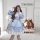Elegant long-sleeve lolita dress with ruffles and pearls, perfect for parties and performances.